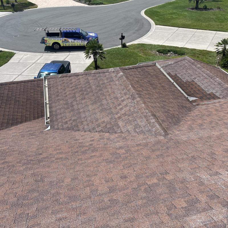 Shingle roof with weathered sections and bay to bay truck Shingle roof with weathered sections and bay to bay truck
