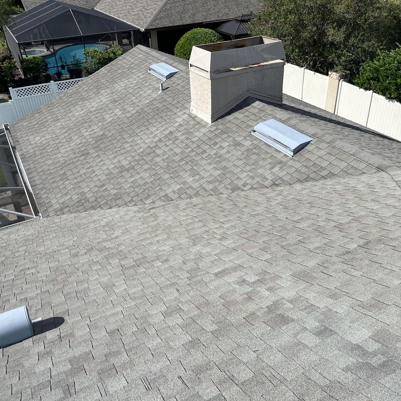 Shingle roof with skylights and chimney in Hudson FL Shingle roof with skylights and chimney in Hudson FL