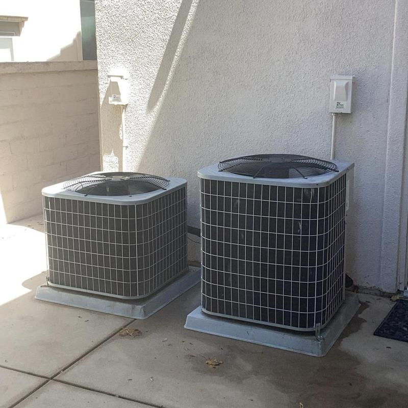 R-22 air conditioning units outdoors side by side R-22 air conditioning units outdoors side by side