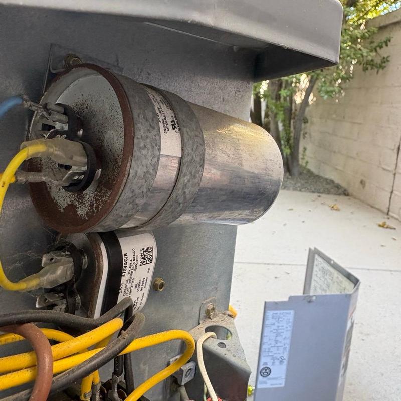 HVAC capacitor and wiring on outdoor unit HVAC capacitor and wiring on outdoor unit