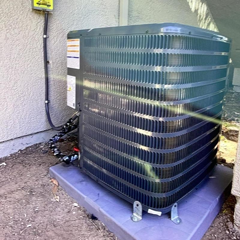 1.5 ton heat pump condenser unit installed outdoors 1.5 ton heat pump condenser unit installed outdoors