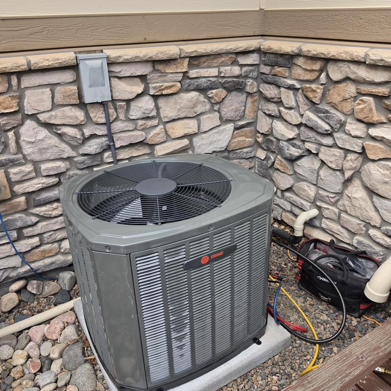 Trane 5TTR3030A1000AA air conditioner installed outdoors