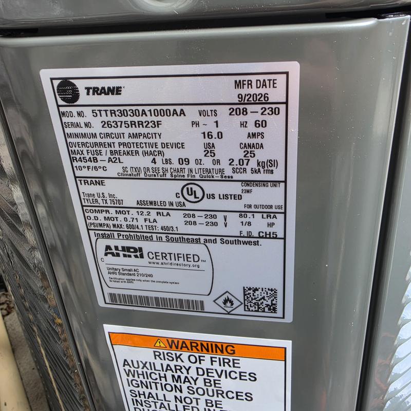Trane 5TTR3030A1000AA air conditioner label close-up