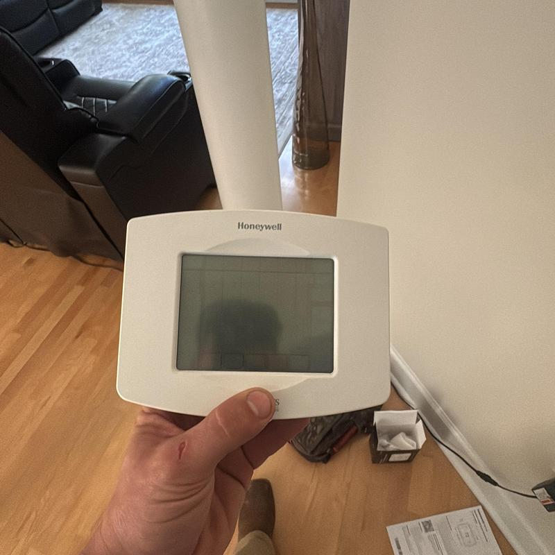 Honeywell thermostat held indoors during replacement Honeywell thermostat held indoors during replacement