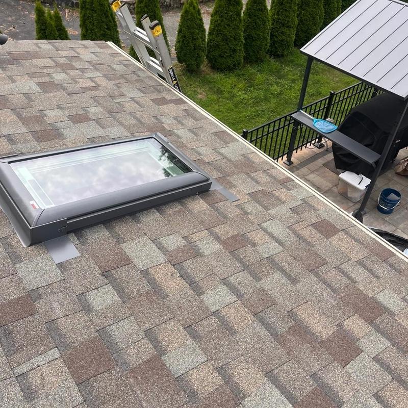 Skylight installed on new CertainTeed shingle roof