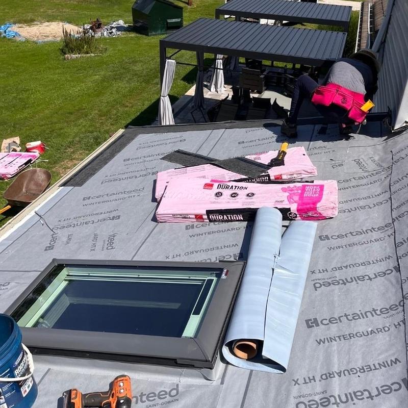 Roof underlayment installation with skylight and tools