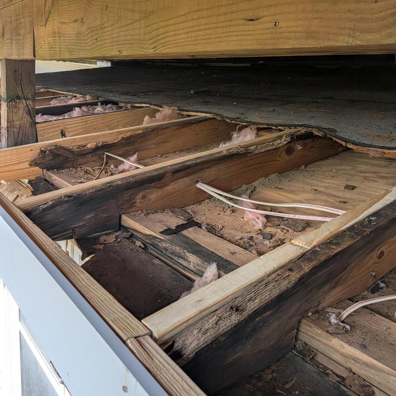 Deck joists with rot and wood replacement work Deck joists with rot and wood replacement work