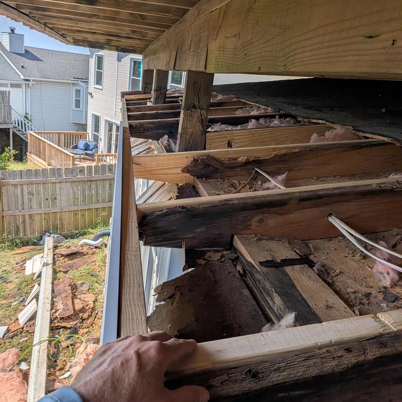Deck joists with extensive wood rot damage Deck joists with extensive wood rot damage