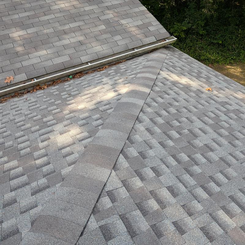 GAF HDZ shingle roof with ridge cap and gutter debris GAF HDZ shingle roof with ridge cap and gutter debris