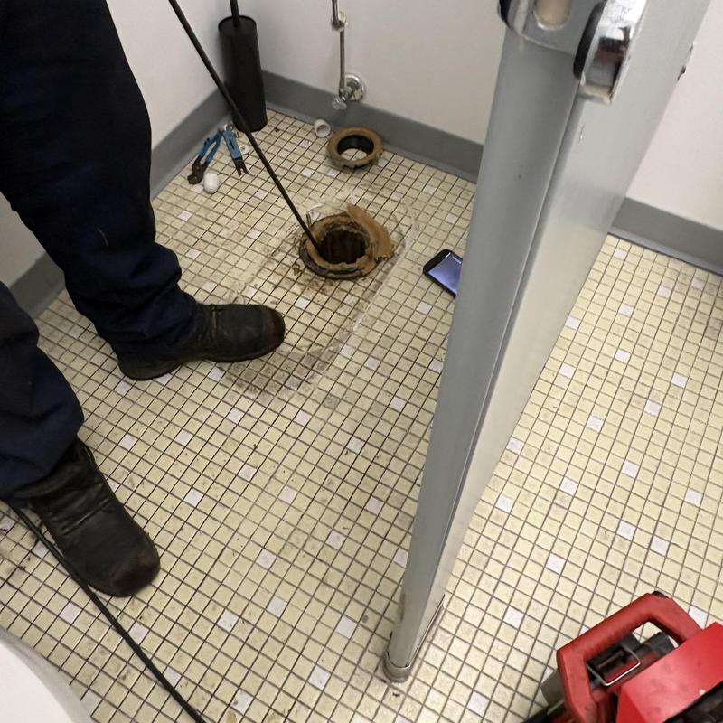 Sewer drain clog removal in tiled bathroom floor Sewer drain clog removal in tiled bathroom floor