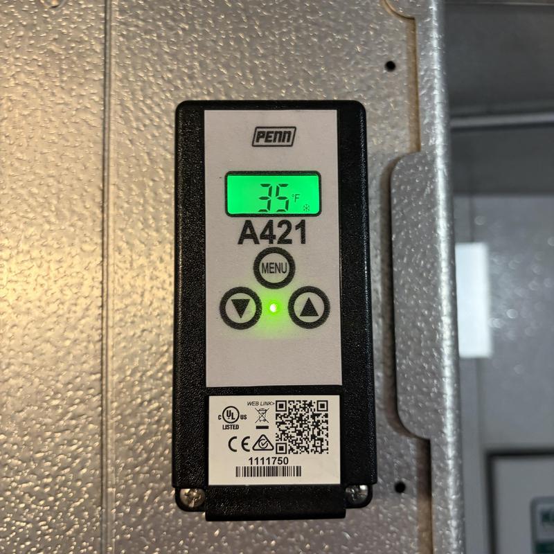 Walk-in cooler temperature control panel at 35°F Walk-in cooler temperature control panel at 35°F