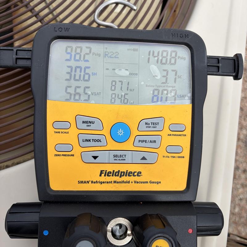 Refrigerant manifold gauge testing on HVAC unit Refrigerant manifold gauge testing on HVAC unit