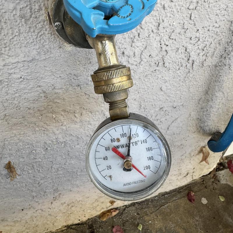 Water pressure gauge on outdoor faucet valve Water pressure gauge on outdoor faucet valve