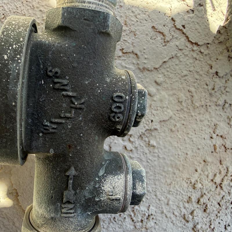 Water pressure reducing valve with pipe connections Water pressure reducing valve with pipe connections