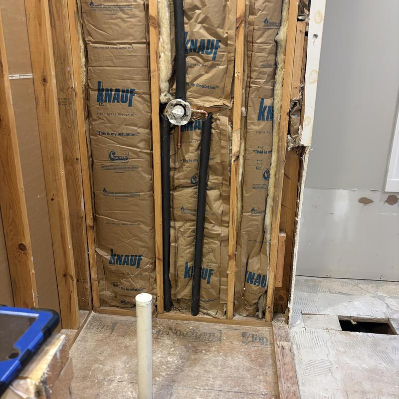 Shower valve and drain plumbing rough-in with insulation Shower valve and drain plumbing rough-in with insulation