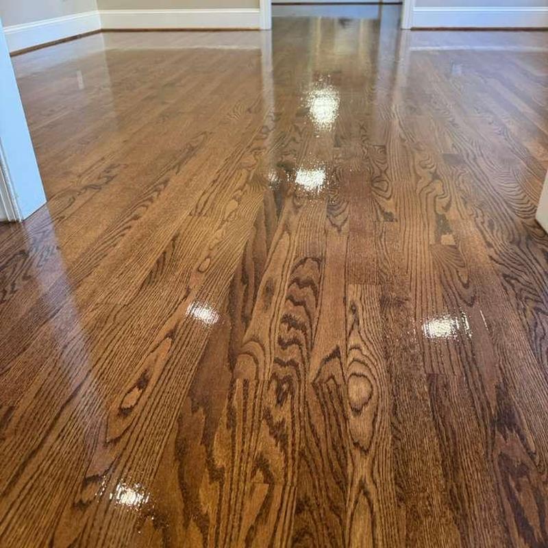 Refinished hardwood floors with glossy finish