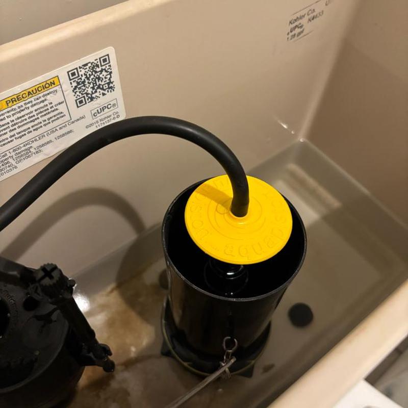 Kohler toilet flush canister with yellow seal installed