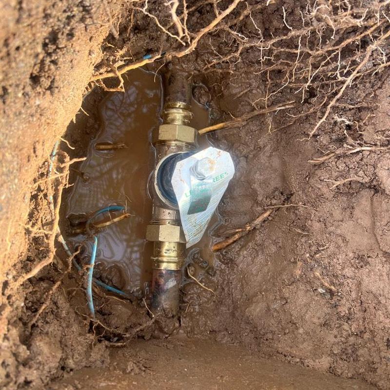 Main water line pressure regulator valve installed outdoors