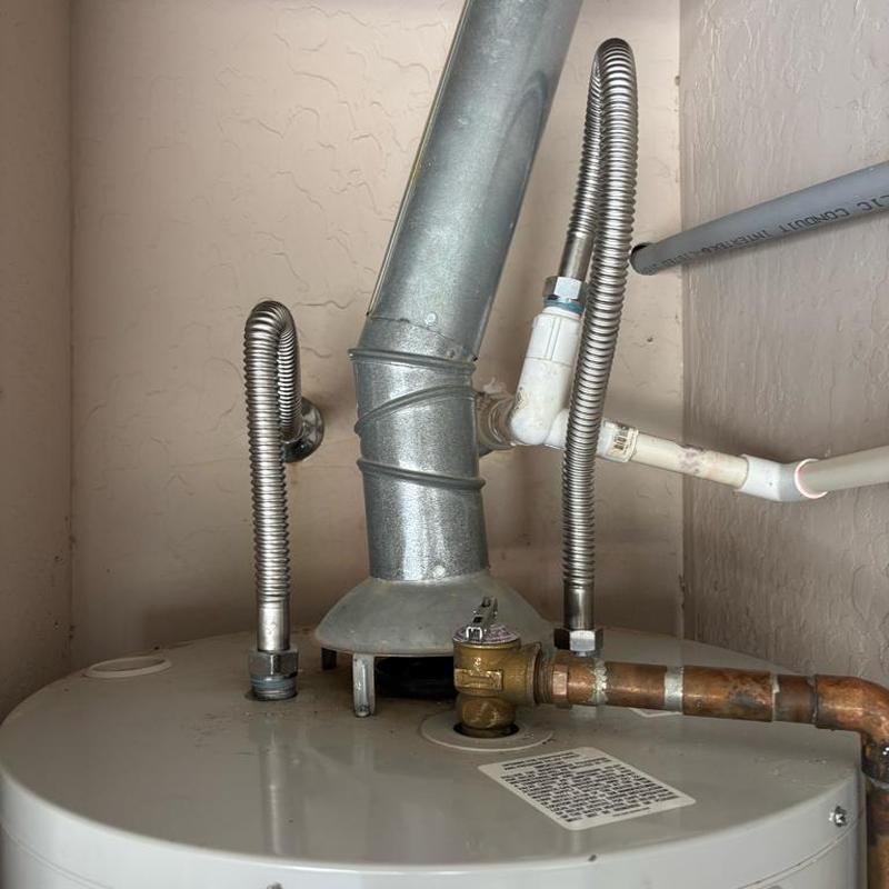Water heater flex lines with vent pipe and valve