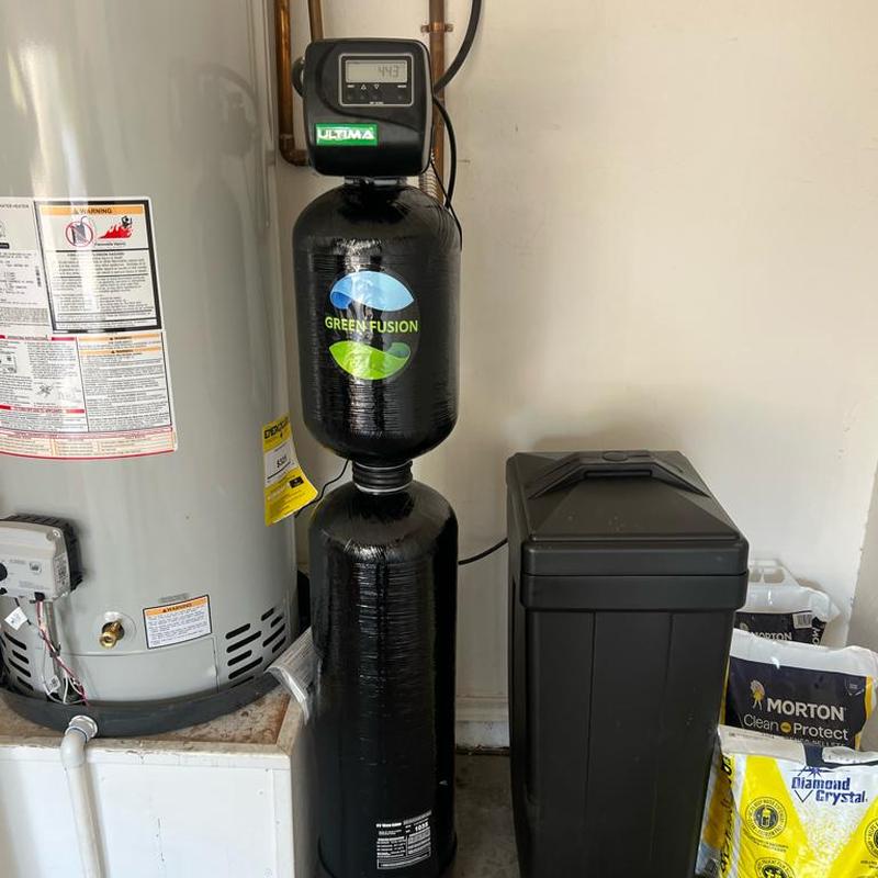 Water softener system and brine tank installation in garage