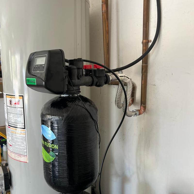 Water softener system installation with copper line adapters