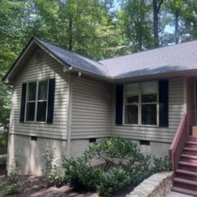 Roof replacement with gutter repair and exterior pressure wash