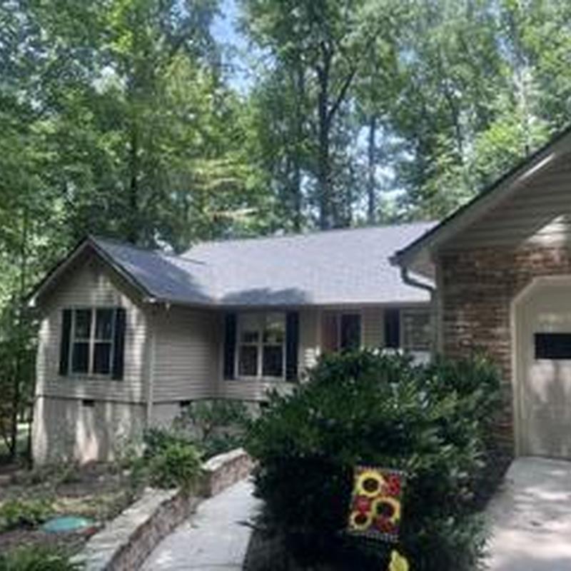 Roof replacement and gutter repair on home exterior