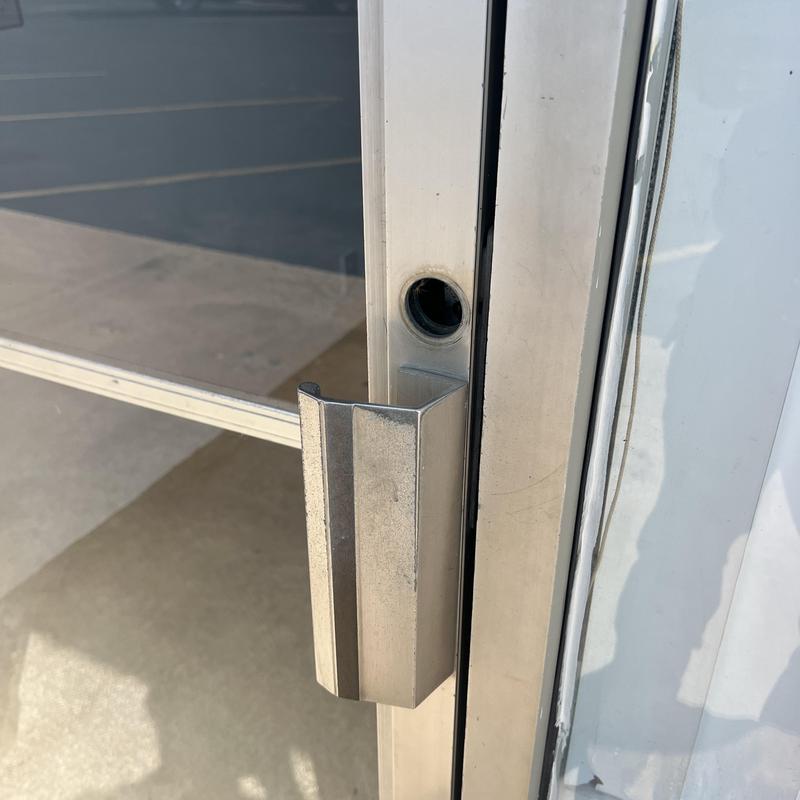 Commercial glass door lock hole without lock cylinder Commercial glass door lock hole without lock cylinder