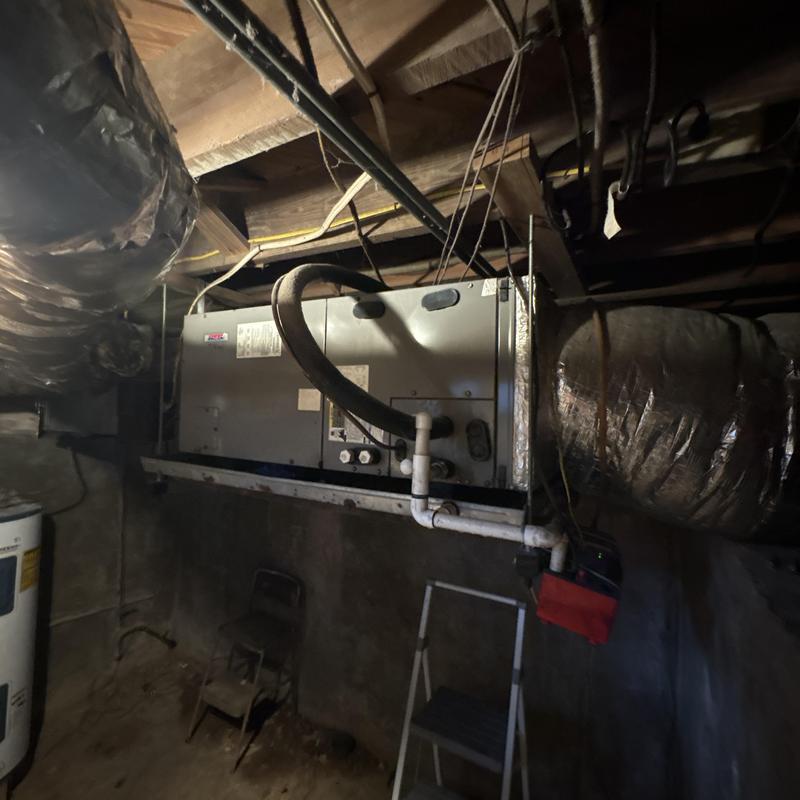 Air handler unit with ductwork in basement repair Air handler unit with ductwork in basement repair