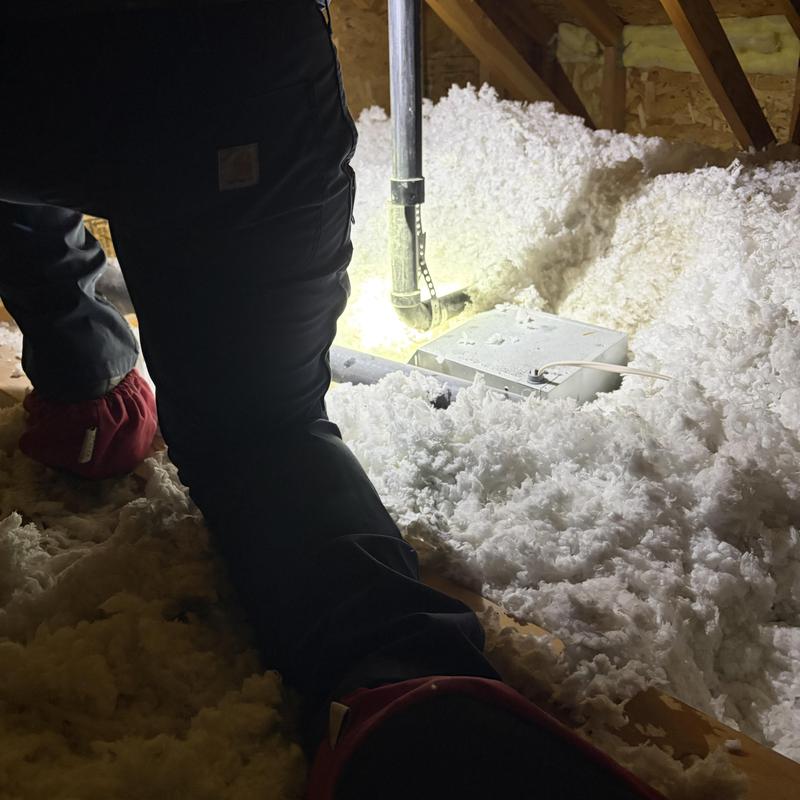 Shower vent pipe with glued ABS coupling in attic insulation