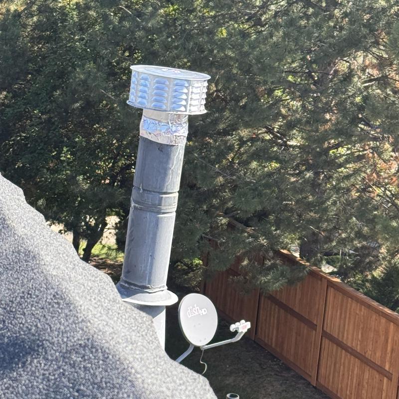 Roof vent pipe with new vent cap installed