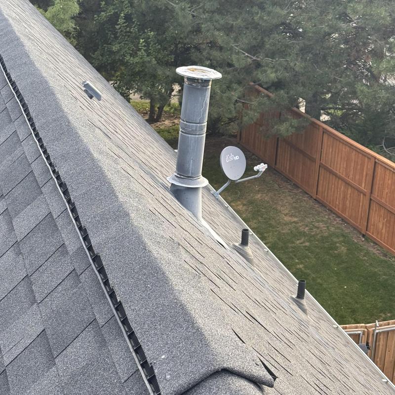 Water heater roof vent with new vent cap installed