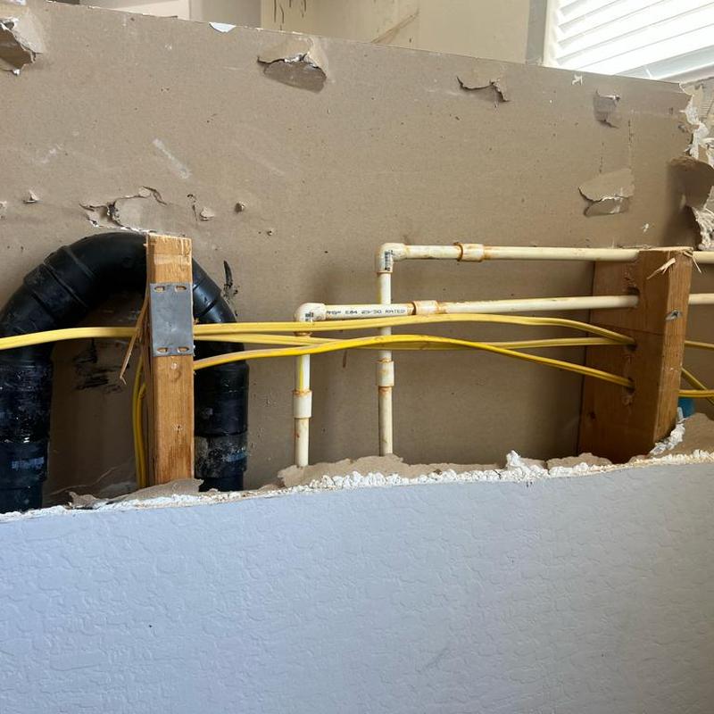 CPVC water lines and drain route behind wall studs CPVC water lines and drain route behind wall studs