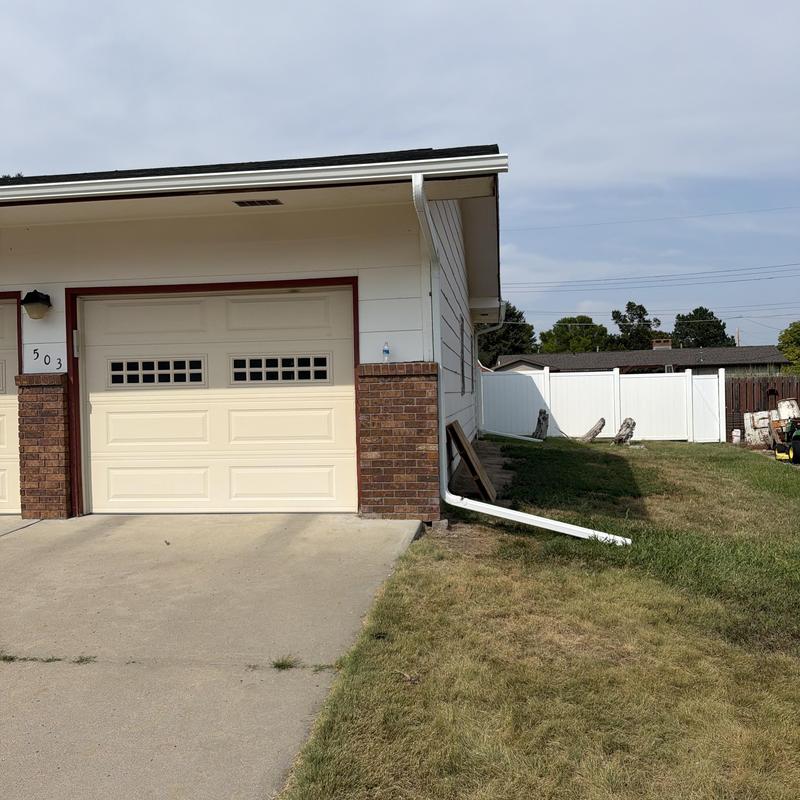 Mastic Aluminum gutters on residential garage exterior Mastic Aluminum gutters on residential garage exterior