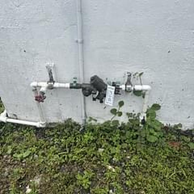 34 Wilkins 975XL3 backflow preventer on building wall