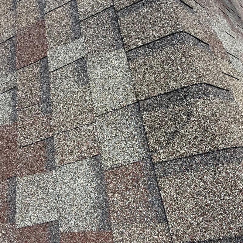 Owens Corning ProEdge AR shingles on roof close-up Owens Corning ProEdge AR shingles on roof close-up