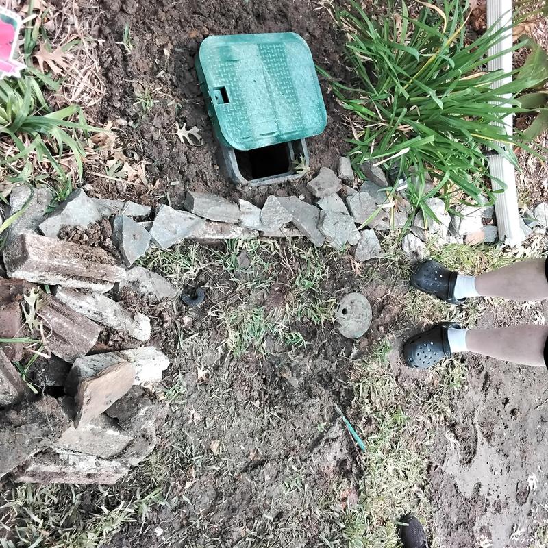 Pex water line and valve box installation in yard Pex water line and valve box installation in yard