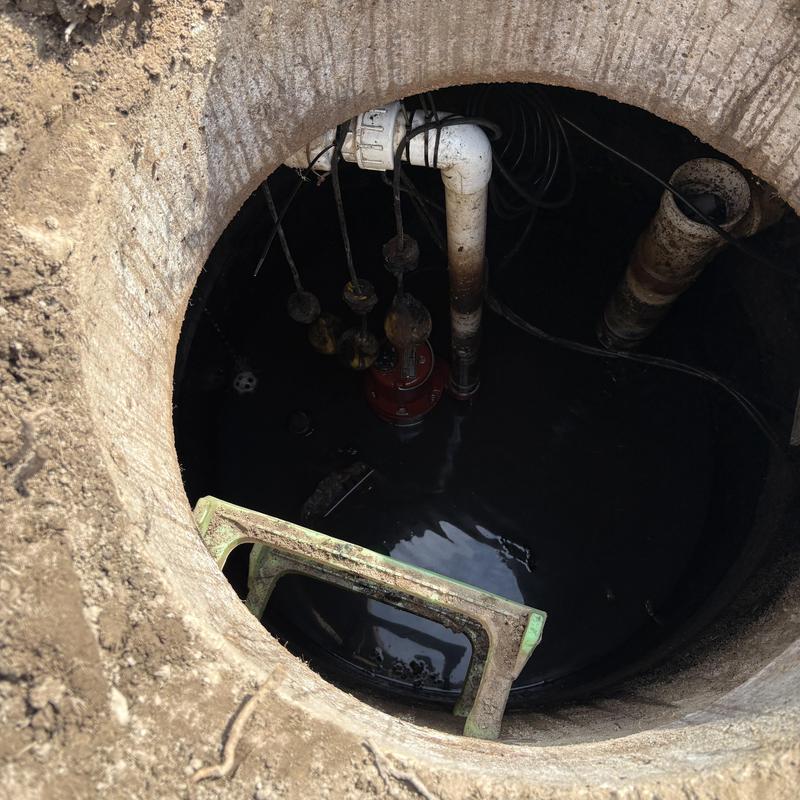 Sewage ejector pump in flooded pump tank Sewage ejector pump in flooded pump tank