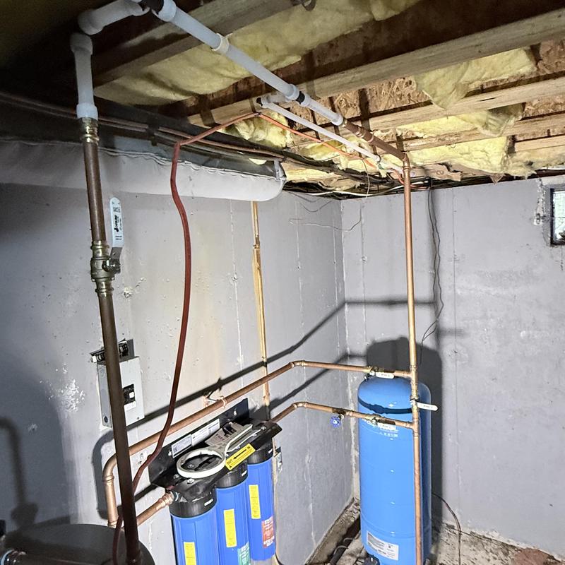 PEX water piping and filtration system in basement PEX water piping and filtration system in basement