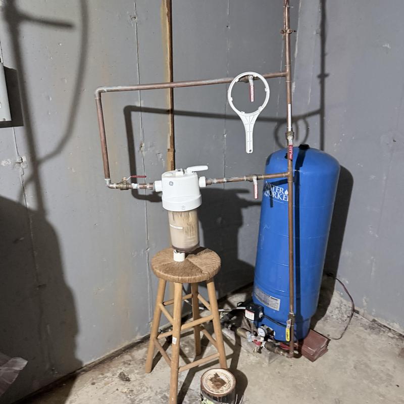 Water pressure tank and filtration system installation Water pressure tank and filtration system installation