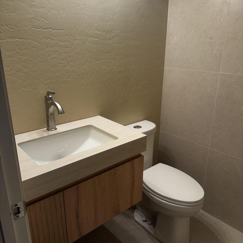 Bathroom vanity with faucet and toilet installation Bathroom vanity with faucet and toilet installation