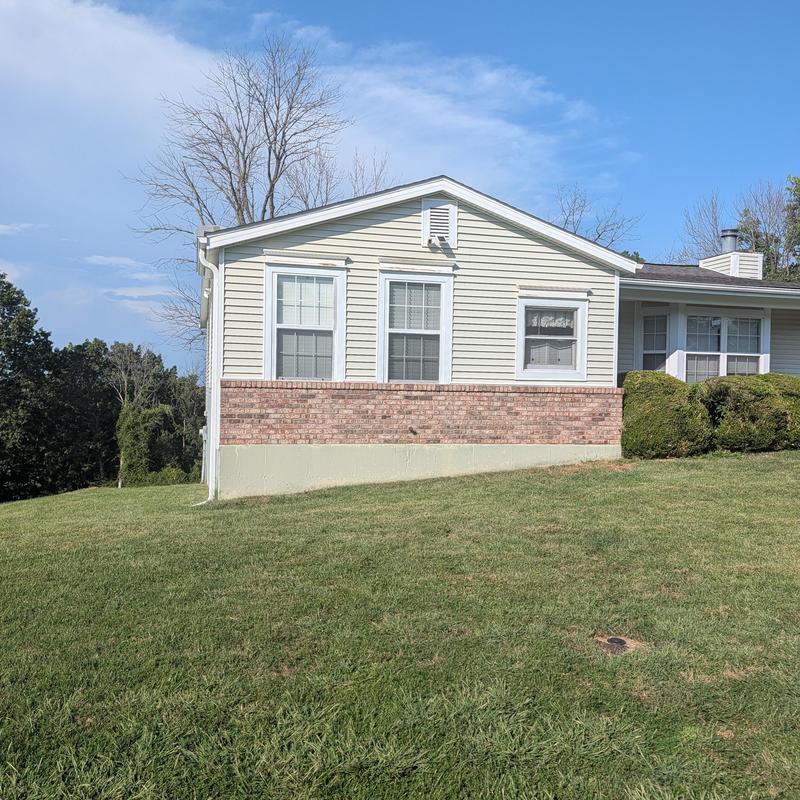 Brick veneer and window flashing issues on home exterior