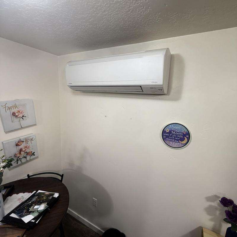 Mini-split indoor air handler mounted on wall Mini-split indoor air handler mounted on wall