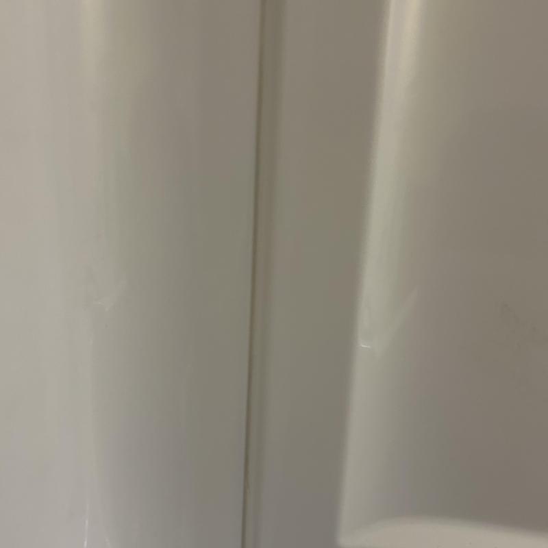 Shower valve replacement in white shower wall Shower valve replacement in white shower wall