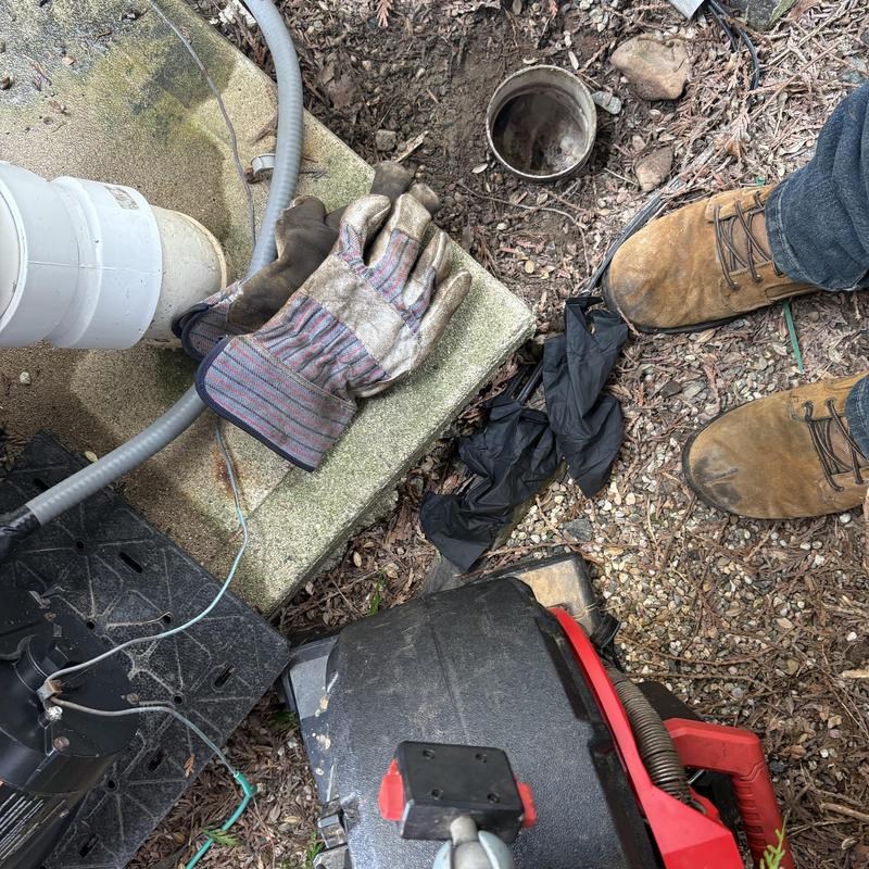 Sewer pipe camera inspection setup with gloves and boots Sewer pipe camera inspection setup with gloves and boots