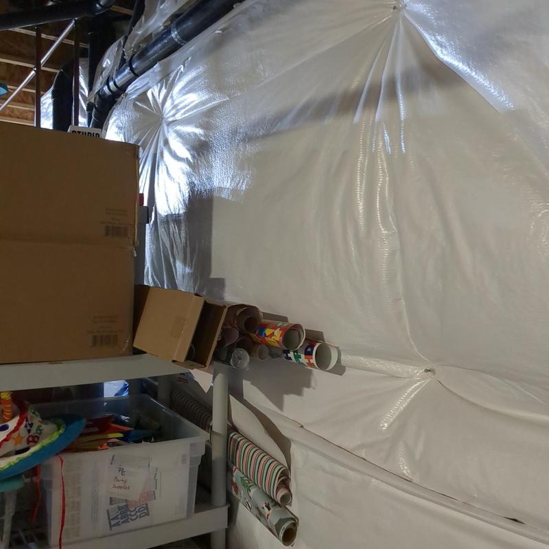 Radon mitigation system PVC piping installation