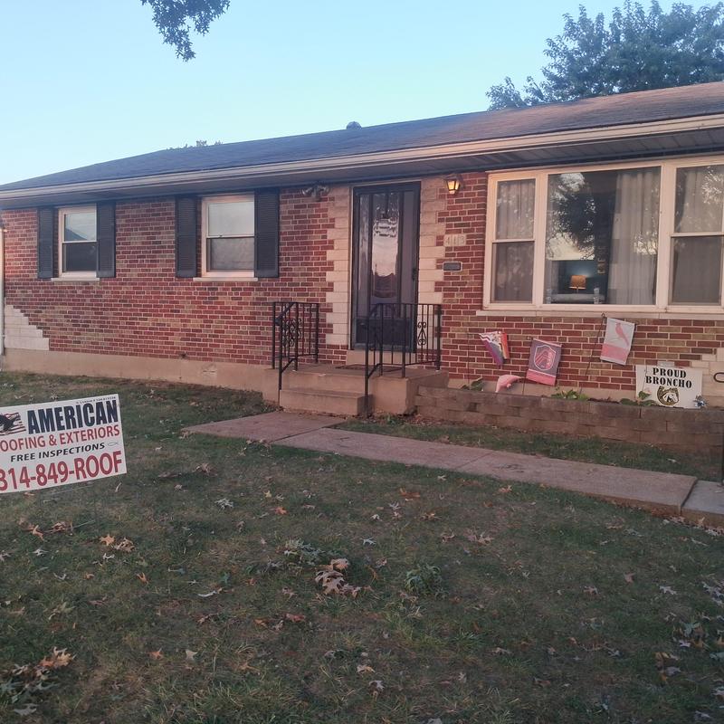 Asphalt shingle roof with new seamless gutters installation