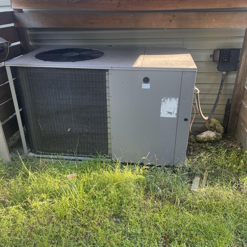 5-ton packaged heat pump unit outside house