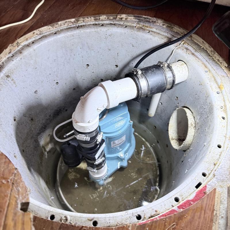 Sump pump and check valve installation in pit Sump pump and check valve installation in pit