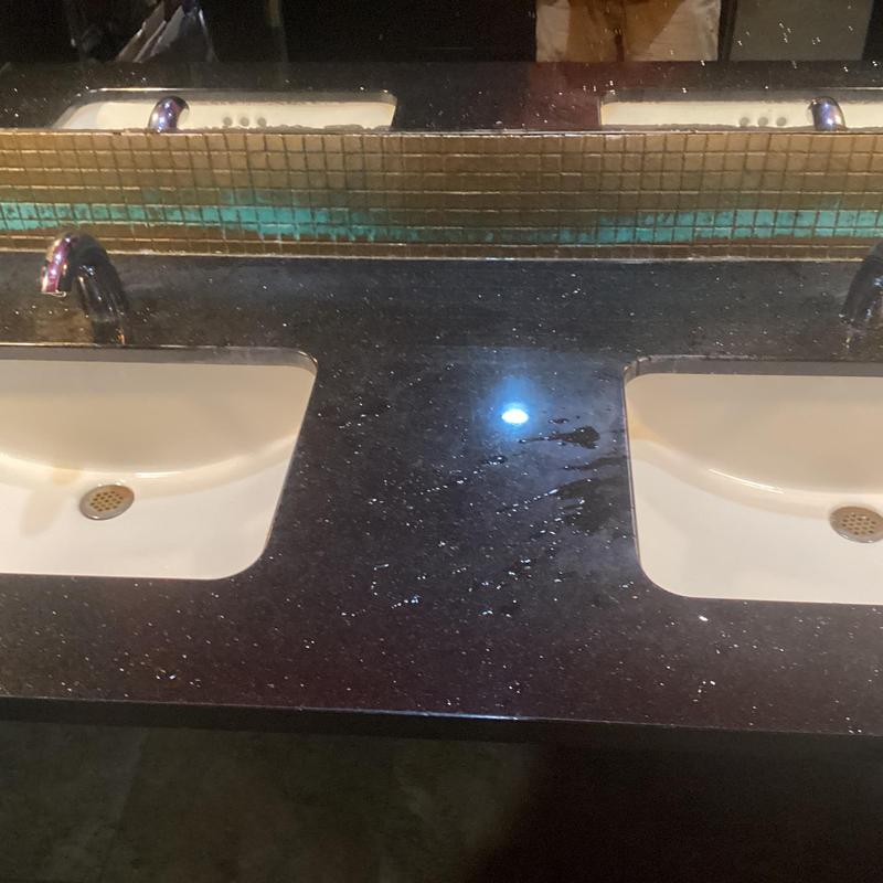 Vanity faucet heads and washbasins in restroom Vanity faucet heads and washbasins in restroom